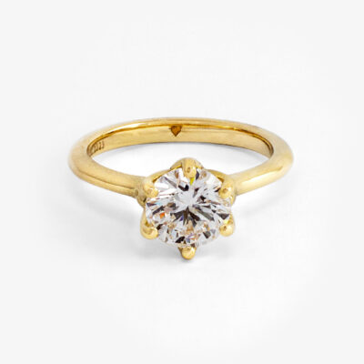 Anillo solitario tulipán con diamante redondo en oro amarillo 14K